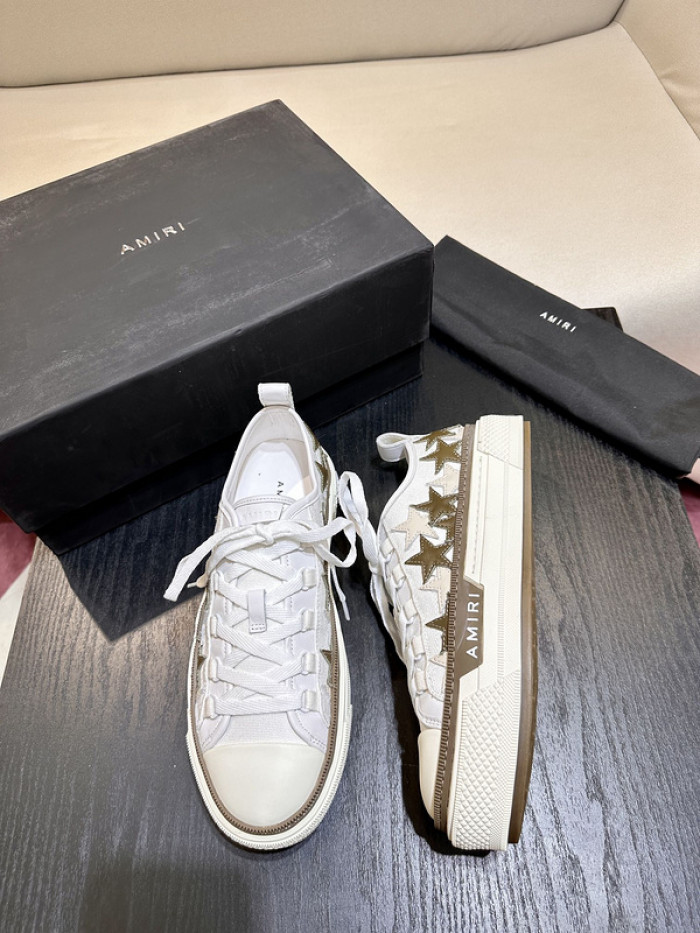 amiri* appliquéd leather and canvas sneakers